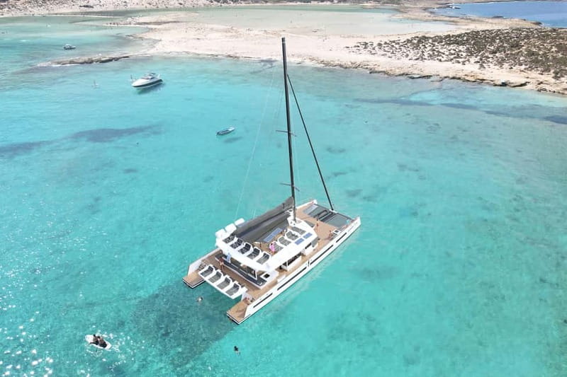 Balos & Gramvousa Catamaran Trip: Meals, Drinks & Transfer - Gramvousa: swimming, shipwreck views, and a wilder shore