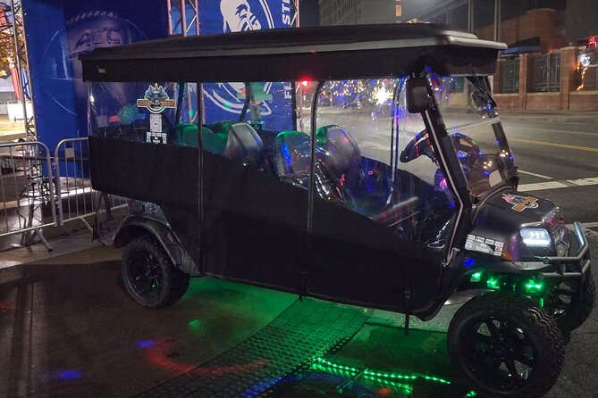 Bar Crawl on a Rollin Disco Ball Golf Cart in Charlotte - Uptown City Park, waterfalls, and Knights Field