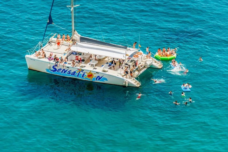 Barcelona: Catamaran Party Cruise with BBQ Meal - Setting sail from Port Olímpic