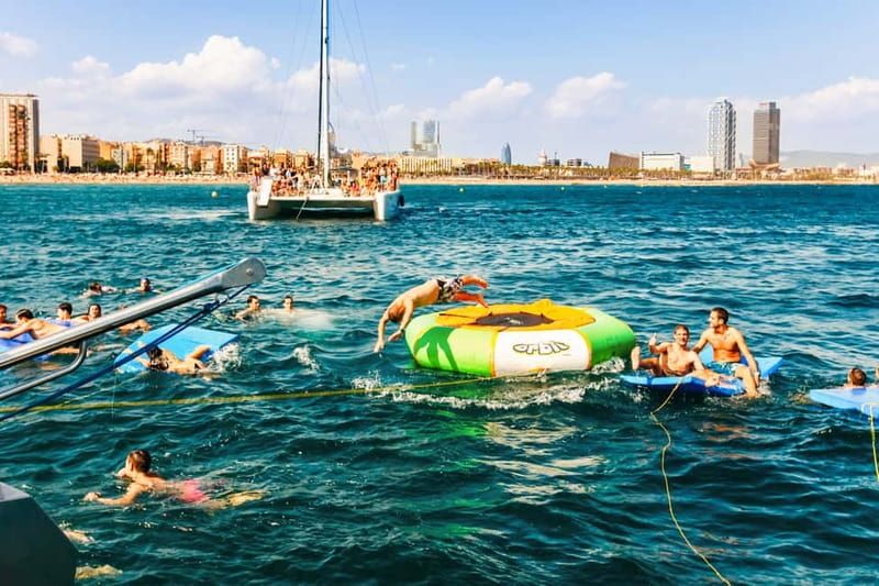 Barcelona: Catamaran Party Cruise with BBQ Meal - The Badalona swimming stop