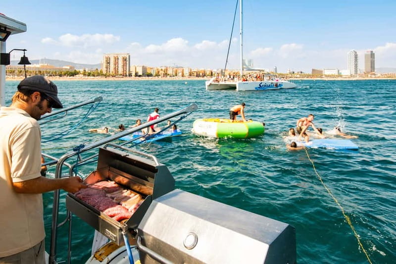 Barcelona: Catamaran Party Cruise with BBQ Meal - An hour of Barcelona coastline by catamaran