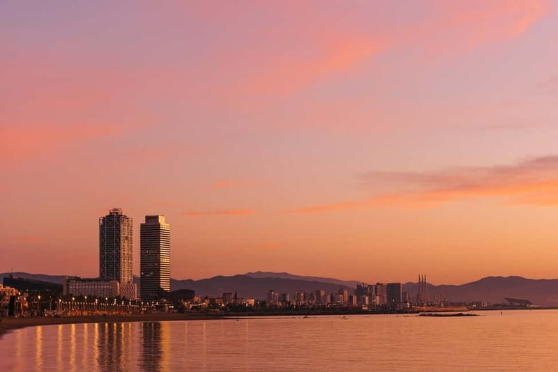 Barcelona: Daytime or Sunset Cruise with Drinks - Vila Olímpica and the changing shoreline