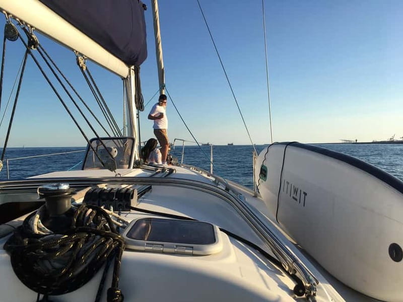 Barcelona: Daytime or Sunset Cruise with Drinks - Drinks, music, and the onboard mood