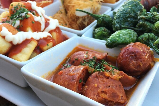 Barcelona Food Tour: Tapas, Drinks and Delights with a Local - Carrer de la Mercè and the first vermouth