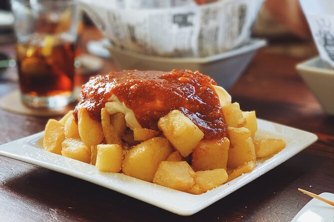Barcelona Food Tour: Tapas, Drinks and Delights with a Local - Plaça de Sant Jaume and a Catalan finish