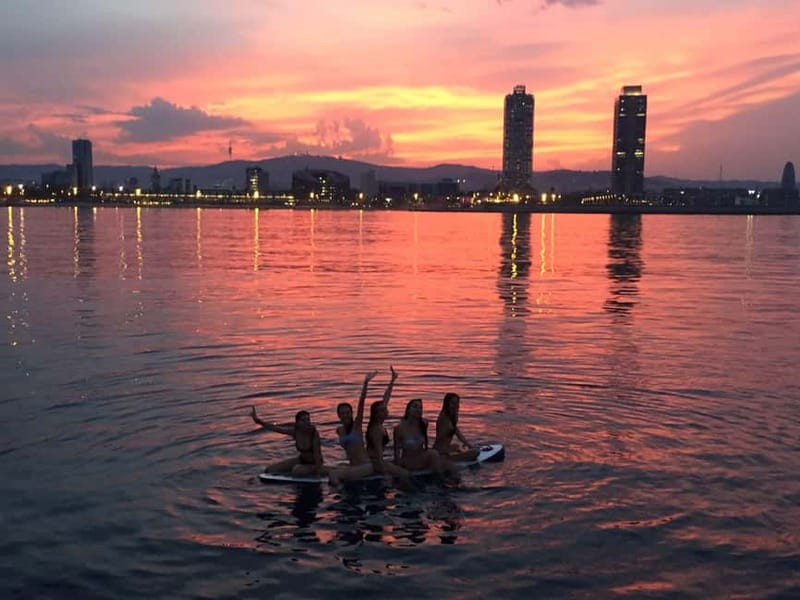 Barcelona: Premium Shared Sunset Cruise (Drinks & Snacks) - The sunset behind Barcelona