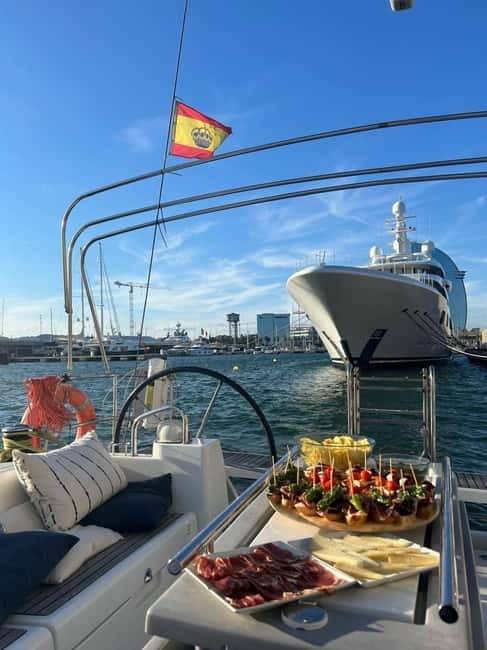 Barcelona: Sailing Tour with Tapas, Drinks and Swim Stop - What the tapas and drinks are like