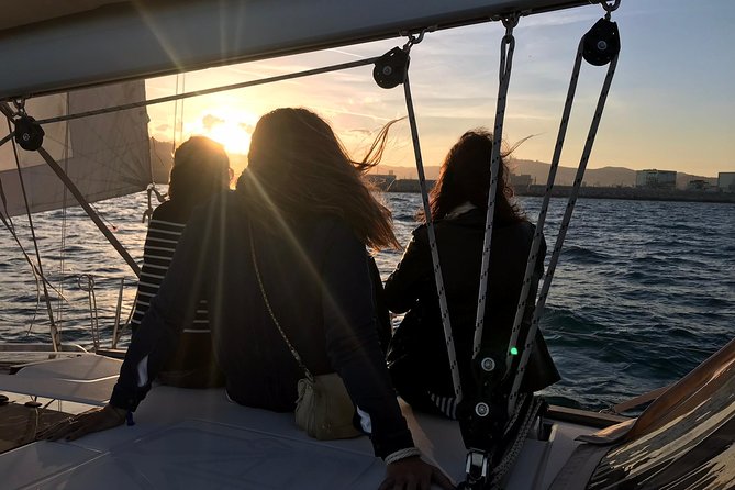 Barcelona Sunset Private Sailing with Light Snacks and Open Bar - The return past Barceloneta and the evening skyline