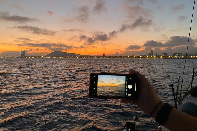 Barcelona Sunset Private Sailing with Live Saxophone and Open bar - Sailing Toward Port Vell and the Old Harbor