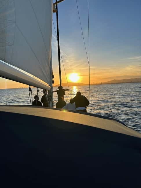 Barcelona: Sunset Sailboat Cruise with Open Bar and Snacks - Along Barceloneta Beach for the main hour