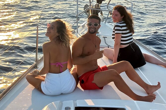 Barcelona Sunset Sailing Cruise from Port Olímpic with Open Bar - The Olympic Towers at golden hour