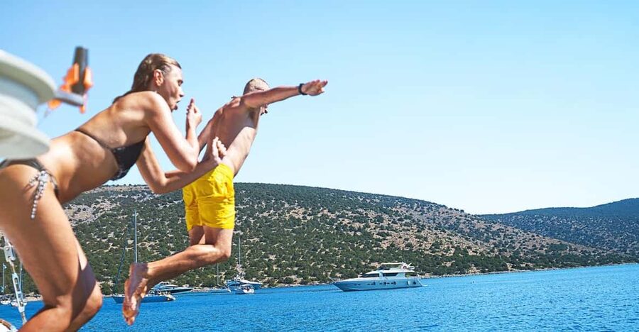 Boat Party to the Beach with Swimming Stops, DJ and Open Bar - Returning through the afternoon or evening