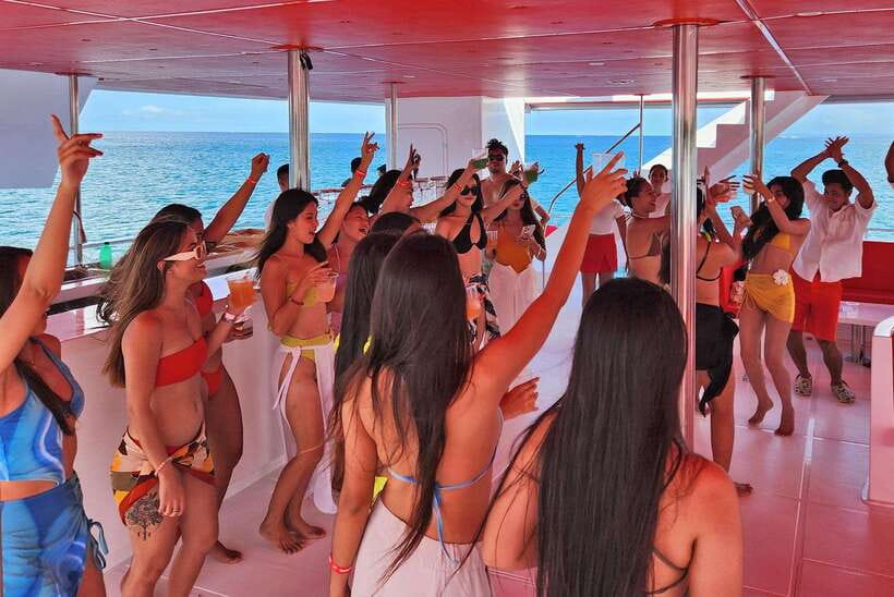 Boracay: Red Whale Party Cruise w/ Snacks & Water Activities - The DJ, dancing, and Boracay sunset