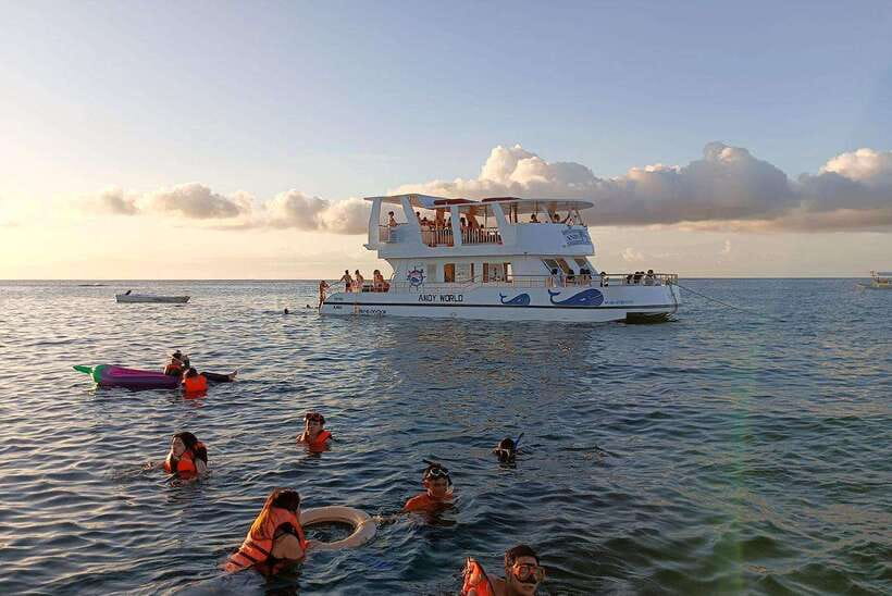Boracay: Ultimate Party Cruise aboard the Andy World Yacht - Setting out from White Beach at sunset