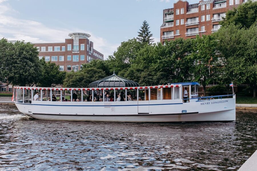 Boston: Charles River Sunset and Cocktail Cruise - Back Bay, Beacon Hill, and the CITGO Sign at dusk