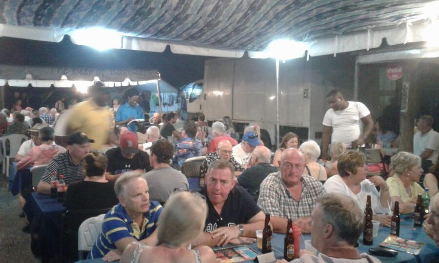 Bridgetown: Oistins reservation with drink & return transfer - Stalls, souvenirs, and time to wander