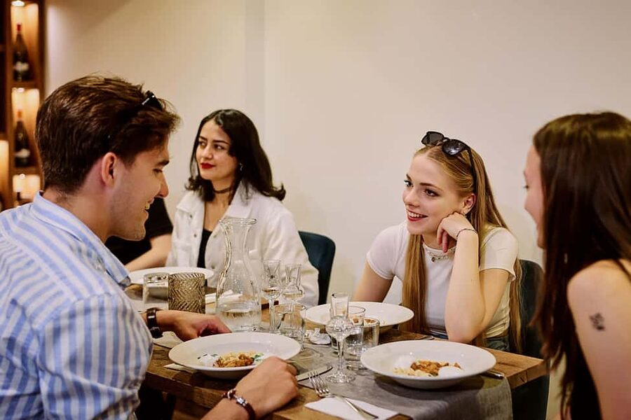 Budapest Guided Food Walking Tour with Drinks Included - Moving from casual counters to sit-down Hungarian dishes