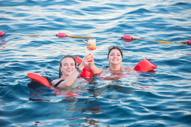 Cabo San Lucas Boat Tour with Snorkeling, Open Bar, and Lunch - The return cruise becomes a floating lunch party