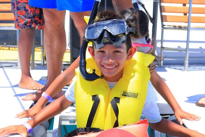 Cabo San Lucas Catamaran Cruise: Snorkel or Sunset Adventure - The open bar, music, and onboard mood