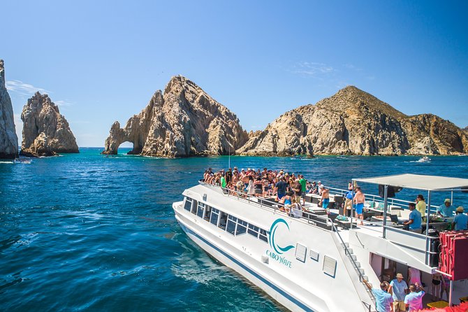 Cabo Sunset Dinner Cruise with Live Music & Open Bar on Cabo Wave - From shrimp cocktail to a full dinner
