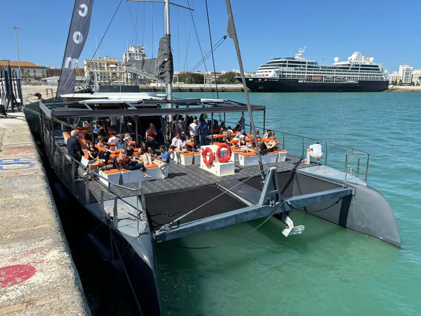 Cádiz: Sunset Catamaran Cruise Tours - Booking, weather, and arrival advice