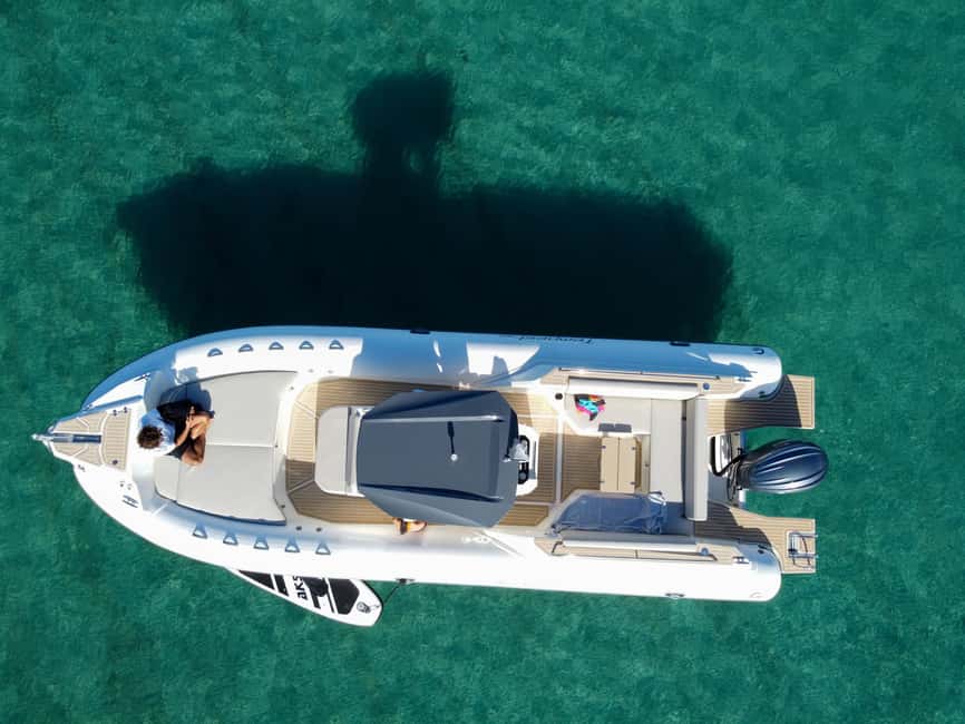 Cagliari: Coastline Cruise with Drinks and Snorkeling - Sella del Diavolo and the cliffs above the water