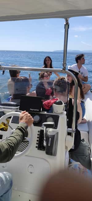 Cagliari: Sella del Diavolo Boat Magic Tour Drinks & Snacks - Cala Fighera and the best photo stops