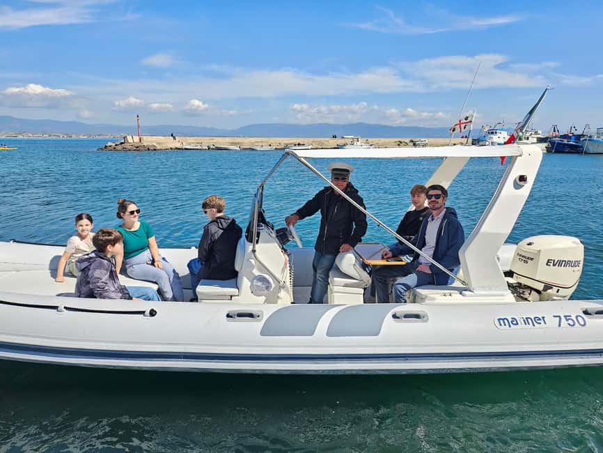 Cagliari: Sella del Diavolo Boat Magic Tour Drinks & Snacks - Sella del Diavolo from the water