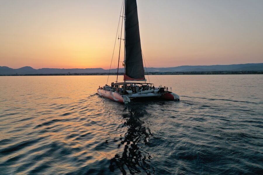 Cambrils: Sunset Catamaran Cruise with Drinks - About 45 minutes to the swimming area