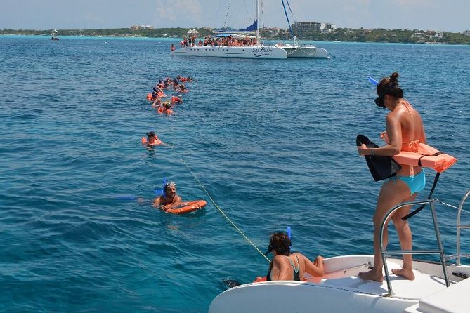 Cancun All Inclusive Catamaran Tour to Isla Mujeres - Isla Mujeres, buffet lunch, and beach-club time