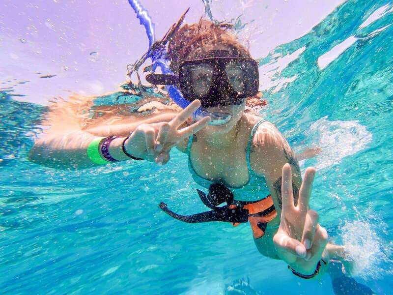 Cancun: Isla Mujeres Catamaran Tour with Open Bar of Drinks - The reef stop: 30 minutes for snorkeling