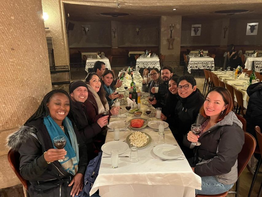 Cappadocia: Turkish Night Unlimited Drinks & Optional Meal - Inside the restaurant, carpets and lanterns set the mood