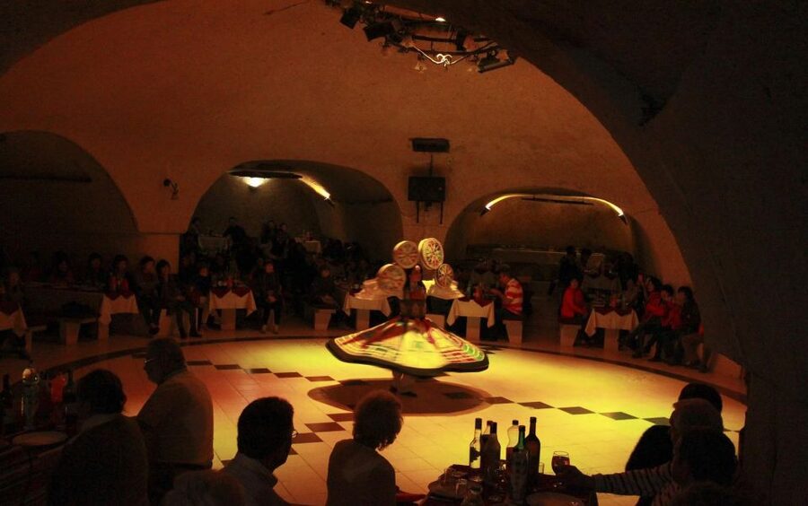 Cappadocia: Turkish Night with Dinner-Unlimited Drinks - A cave restaurant sets the tone