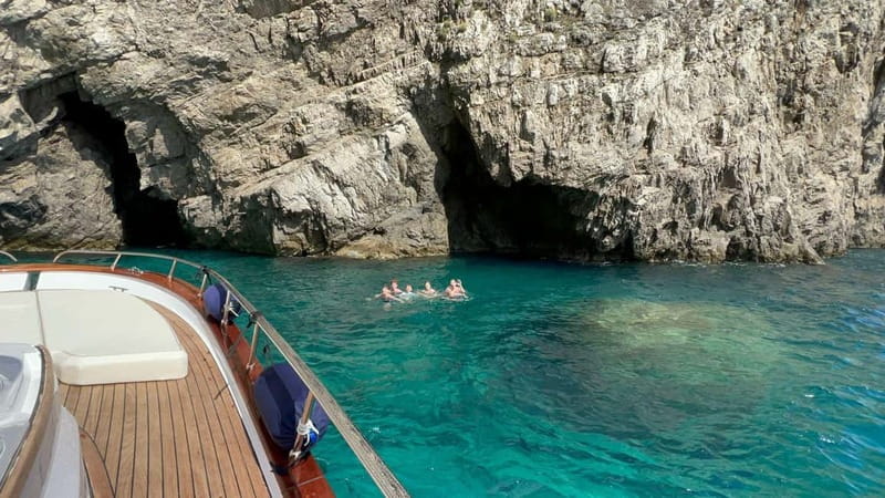 Capri: All Inclusive Boat Cruise with City Tour - The western coast: coves, lighthouse, and sea caves