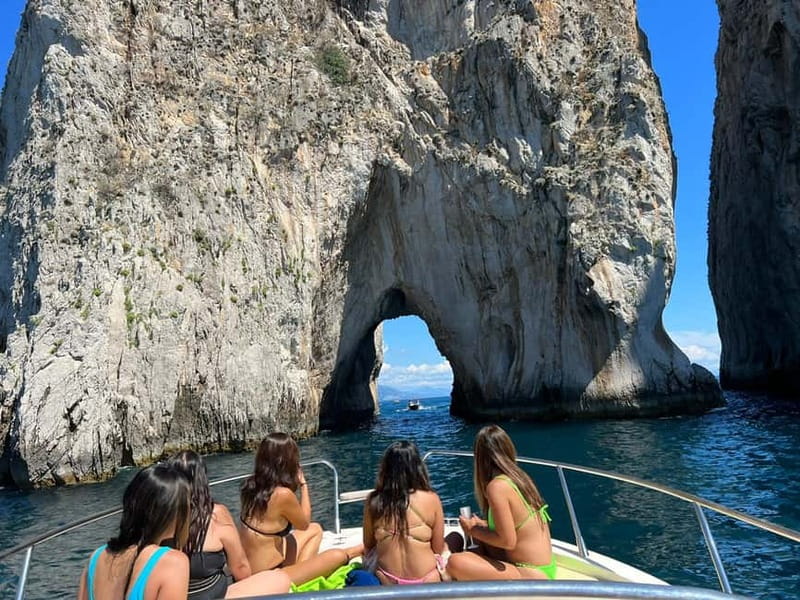 Capri: All Inclusive Boat Cruise with City Tour - Punta Ventroso is the main swim and food stop