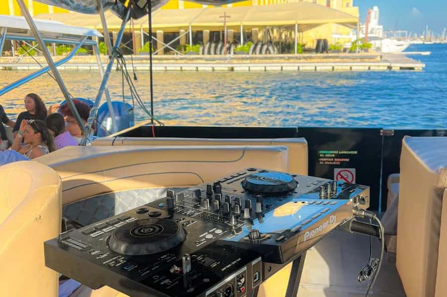 Cartagena: Boat Party in the Bay of Cartagena with Open Bar - Castillogrande and the polished coastal view