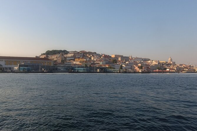 Cascais to Lisbon Sunset Cruise With Open Bar - Passing under the 25th of April Bridge