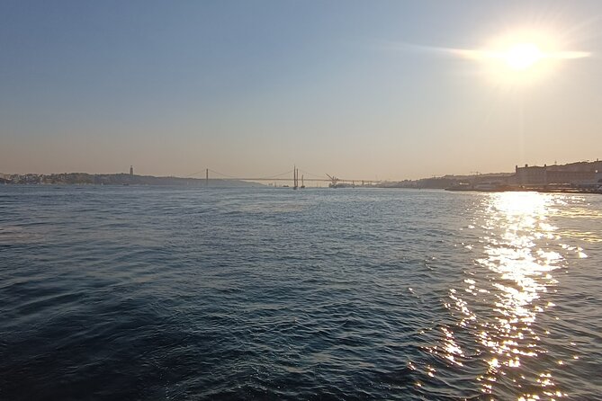 Cascais to Lisbon Sunset Cruise With Open Bar - Arriving at Praça do Comércio after dark