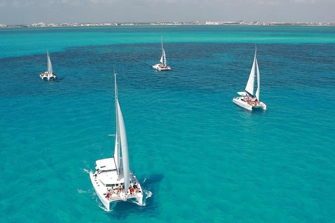 Catamaran adventure to Isla Mujeres with Snorkel,Buffet,Open Bar and Beach Club - Snorkeling near Isla Mujeres