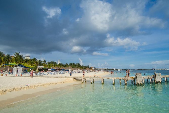 Catamaran adventure to Isla Mujeres with Snorkel,Buffet,Open Bar and Beach Club - A party boat with helpful crew