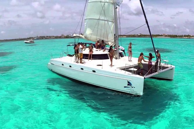 Catamaran adventure to Isla Mujeres with Snorkel,Buffet,Open Bar and Beach Club - Weather, cancellations, and practical planning