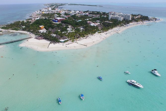 Catamaran adventure to Isla Mujeres with Snorkel,Buffet,Open Bar and Beach Club - The early start and Marina Albatros