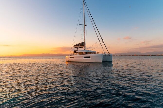 Catamaran Day & Sunset Cruises with meals Drinks and transportation - Two hours at Rhenia for swimming and snorkeling