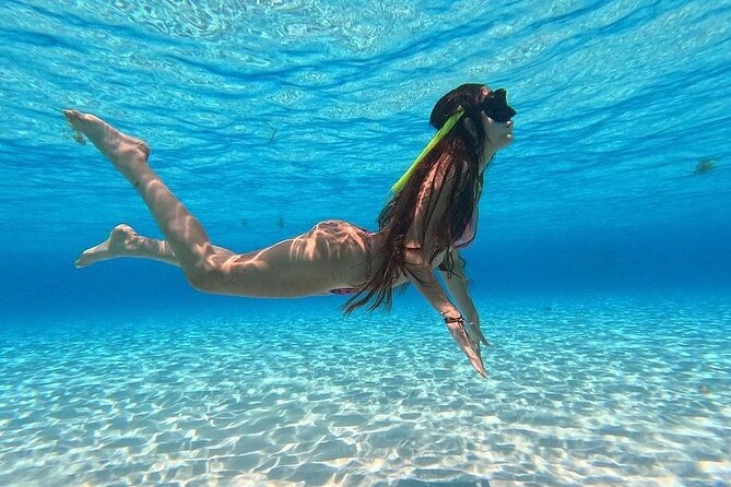 Catamaran in Cozumel with snorkeling at El Cielo and open Bar - Food, drinks, and the boat’s party mood