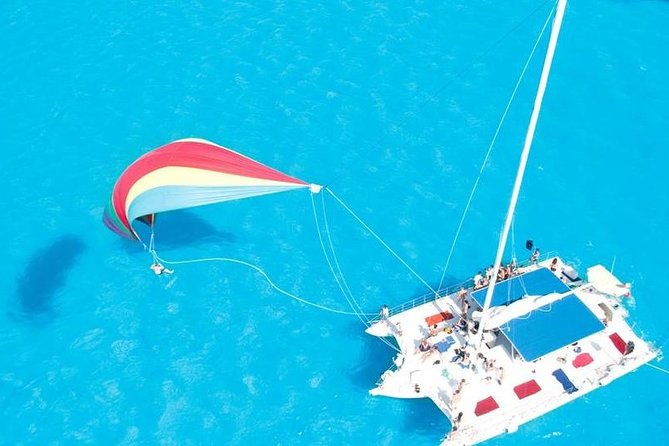 Catamaran Sailing to Isla Mujeres with Snorkeling, Lunch & Open Bar included - Sailing toward Isla Mujeres