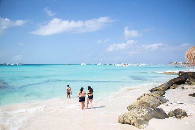 Catamaran Sailing to Isla Mujeres with Snorkeling, Lunch & Open Bar included - Lunch and beach club time on Isla Mujeres
