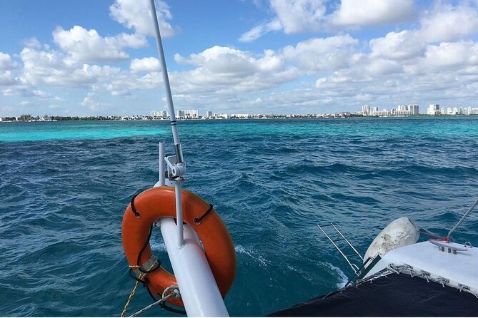 Catamaran to Isla Mujeres, Open bar, buffet, Beach Club Included - The beach club question needs careful attention