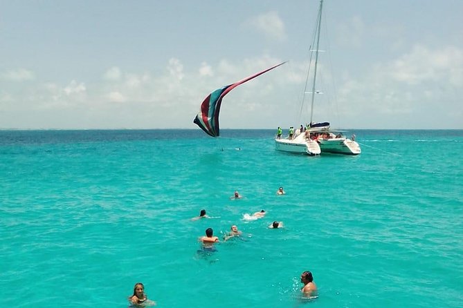 Catamaran to Isla Mujeres, Open bar, buffet, Beach Club Included - Sun, shade, and what to pack
