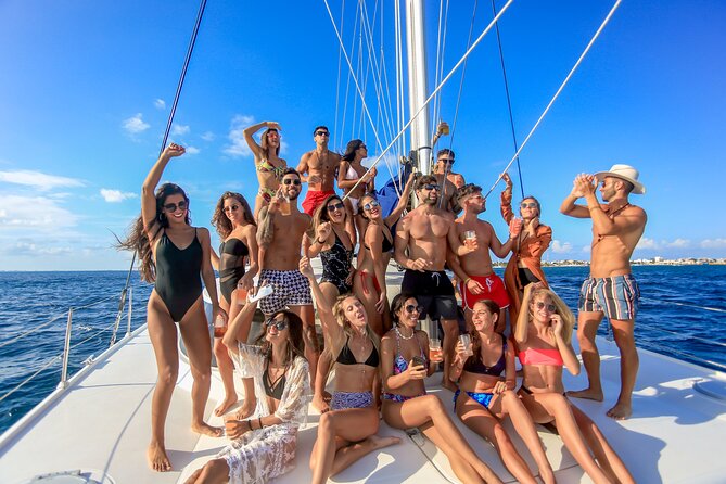 Catamaran to Isla Mujeres Snorkeling Tour with Open Bar and Lunch - Marina Las Perlas and the two departure times