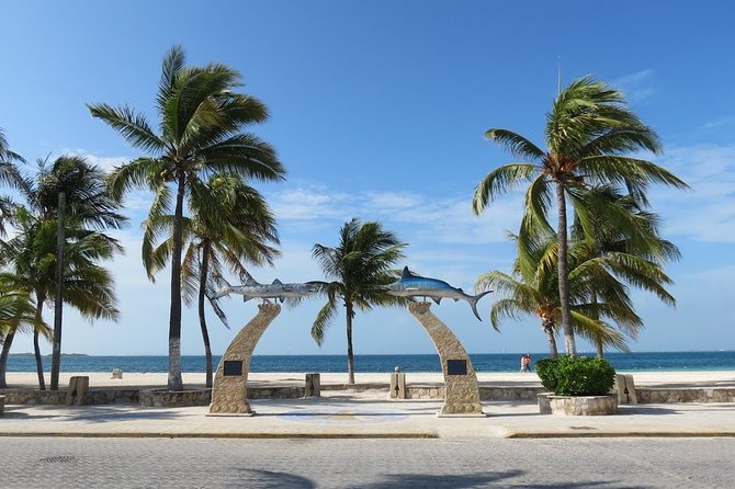 Catamaran Tour to Isla Mujeres, Open bar, Lunch, Snorkeling, Beach Club Included - What this Cancun catamaran day is really like